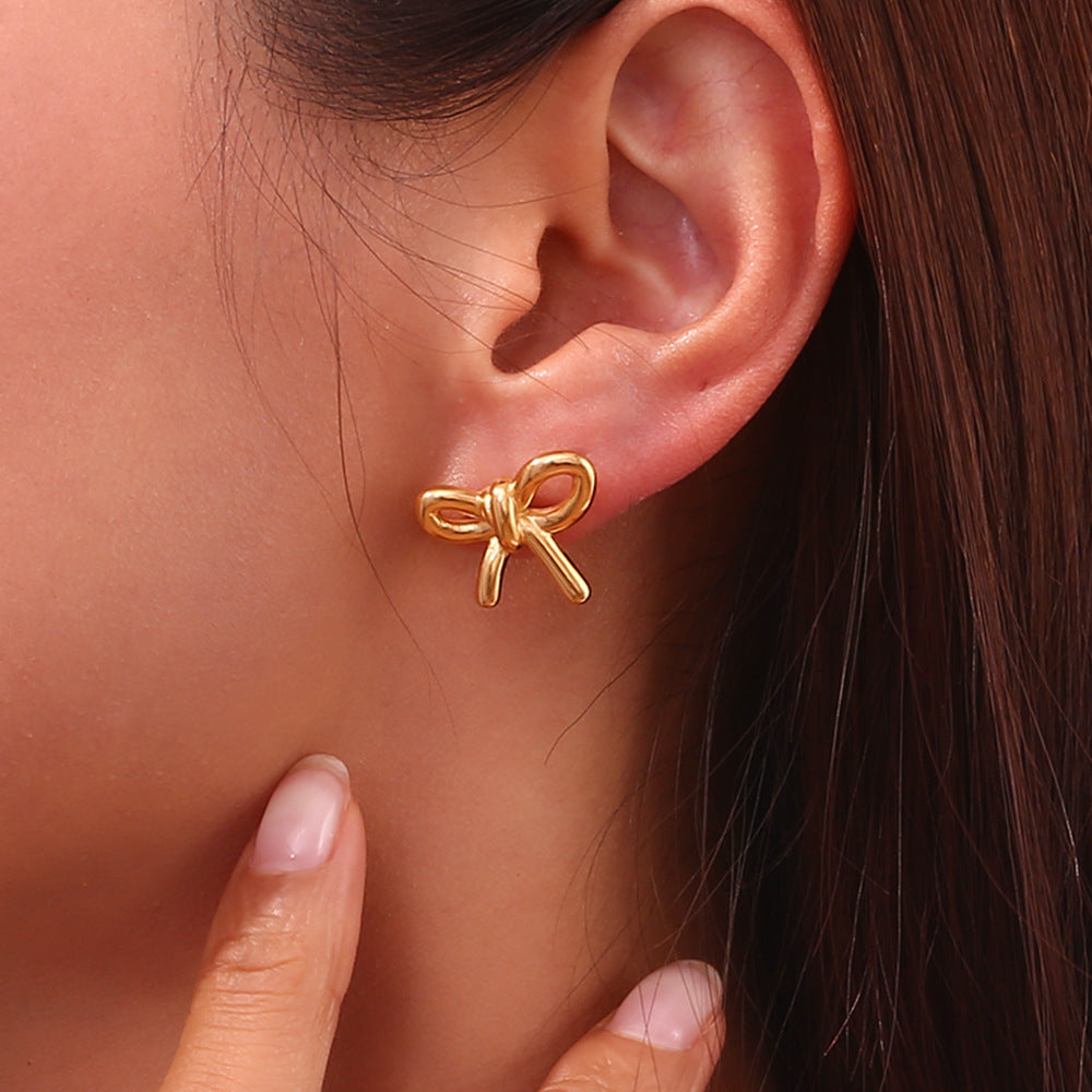 Glossy Gold Bow Stud Earrings