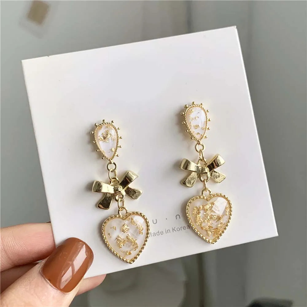 Golden Bowknot Heart Resin Earrings