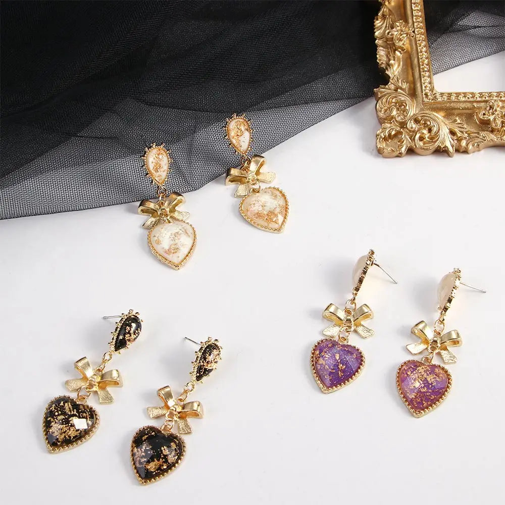 Golden Bowknot Heart Resin Earrings