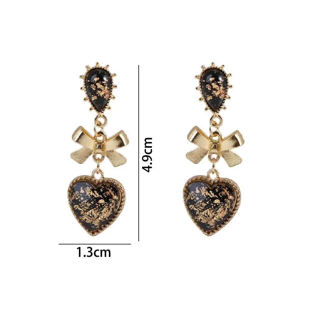 Golden Bowknot Heart Resin Earrings