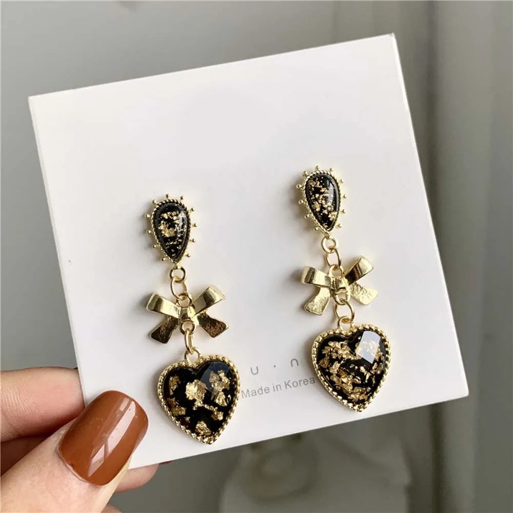 Golden Bowknot Heart Resin Earrings