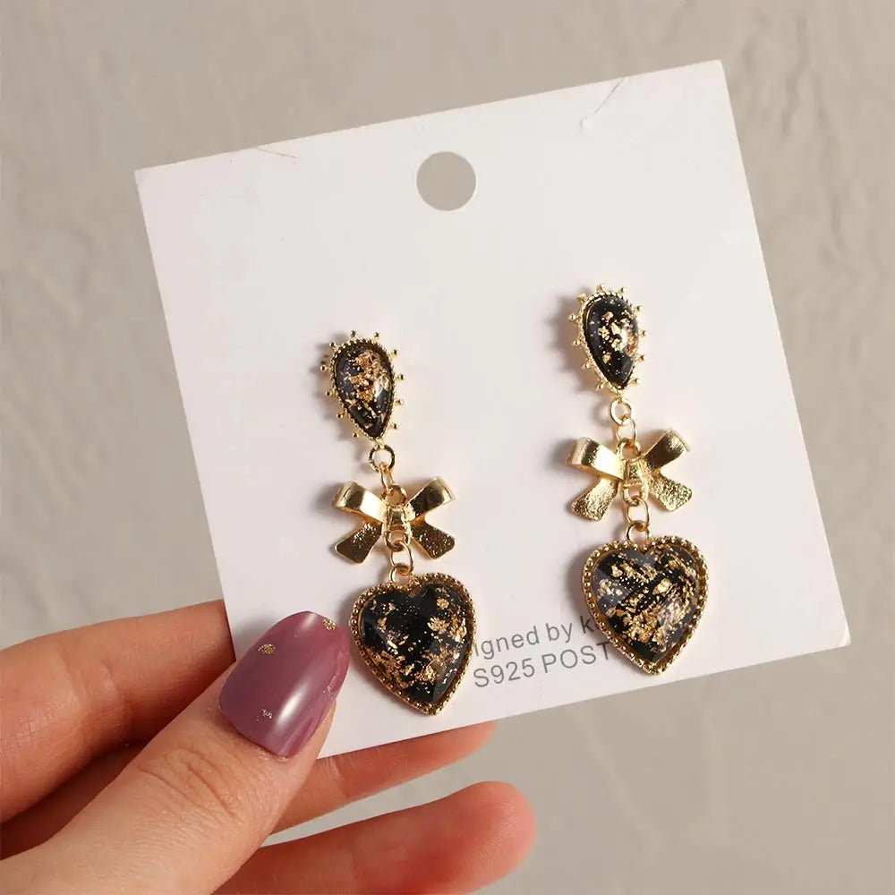 Golden Bowknot Heart Resin Earrings