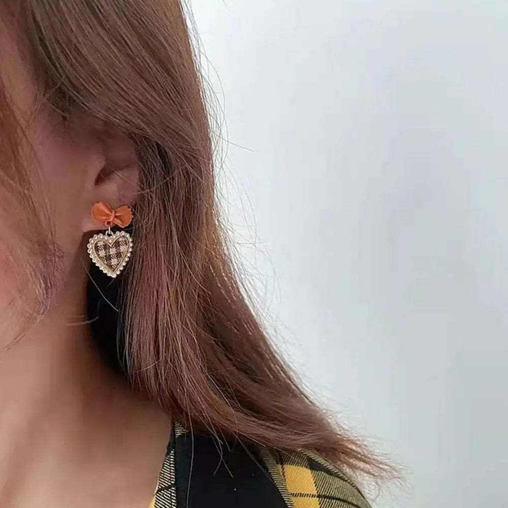 Golden Bowknot Heart Resin Earrings